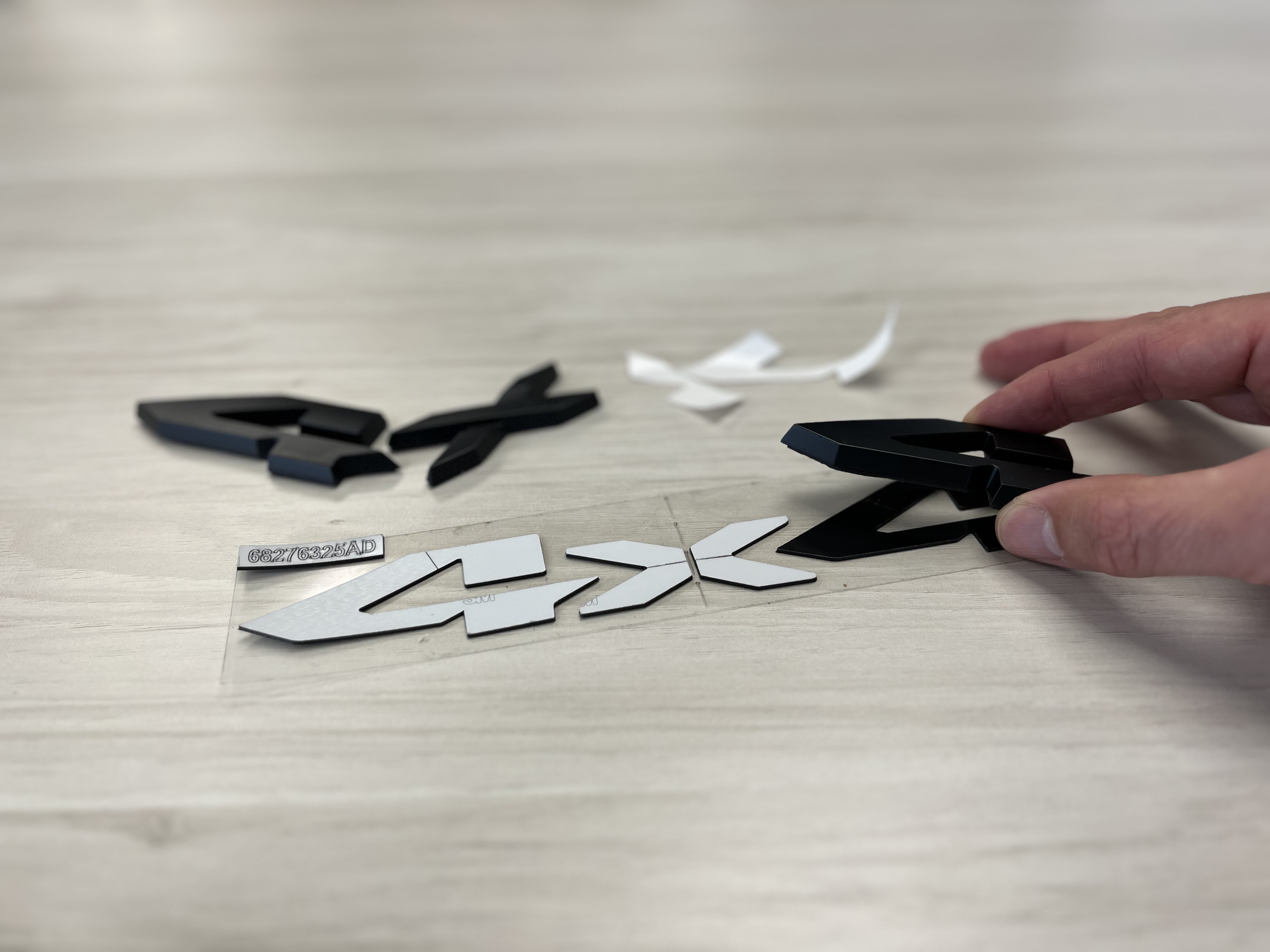 Precision Cut tape for Reattaching Emblems